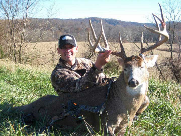young corey memering with whitetail buck