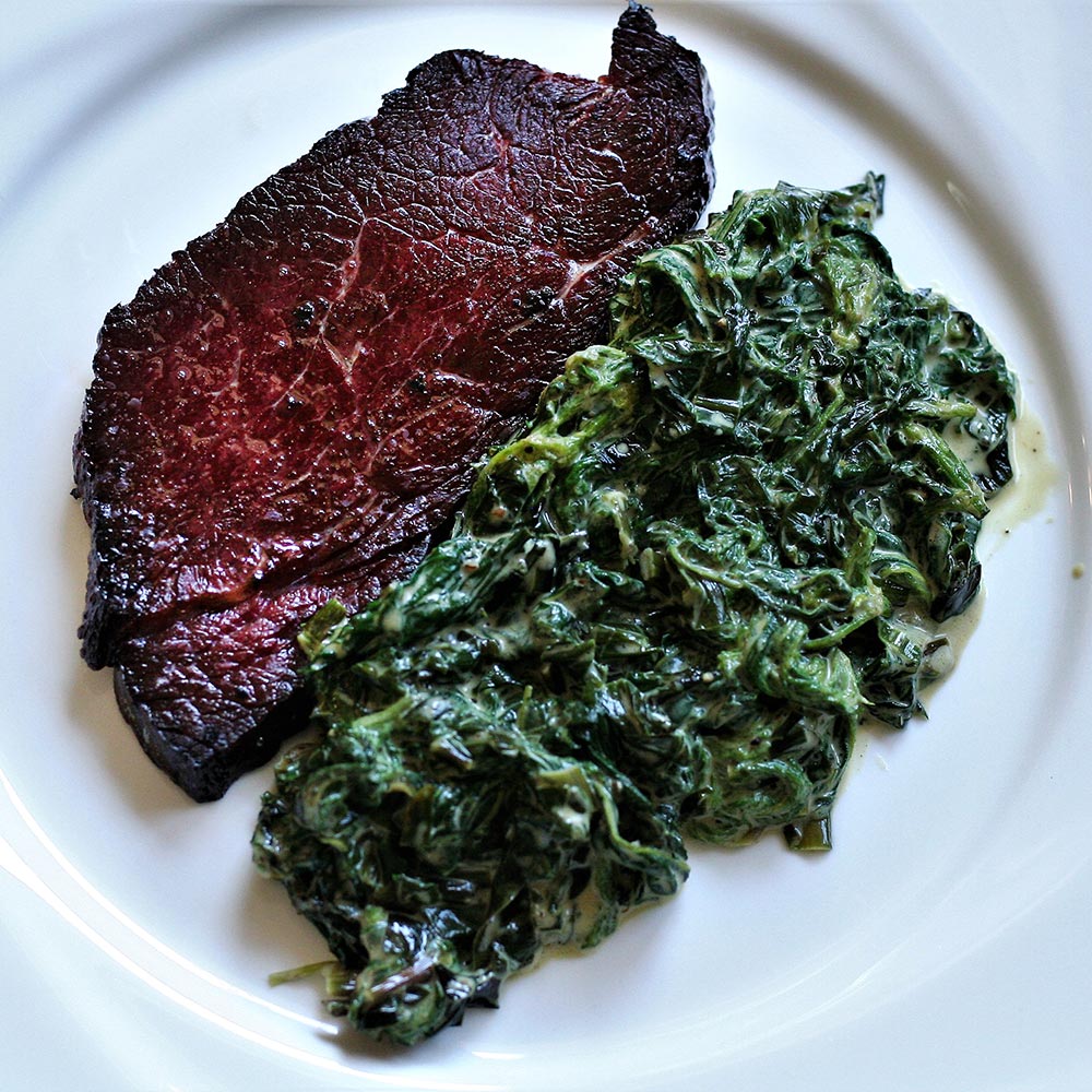 venison ham steaks and cooked nettles