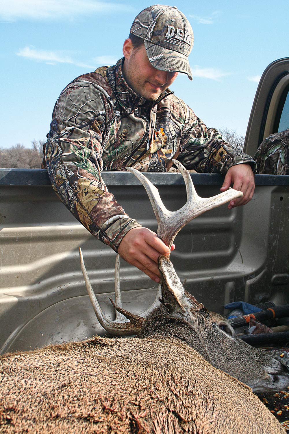 Jake Fagan with prime whitetail during Kansas hunt