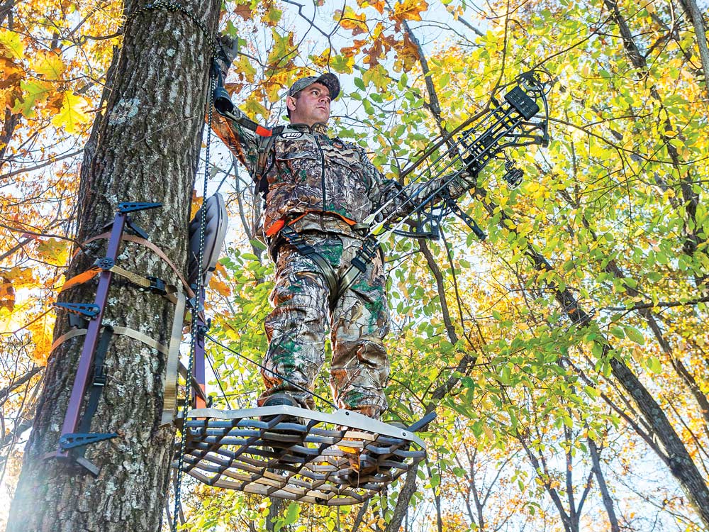 Iowa bowhunter in treestand during October