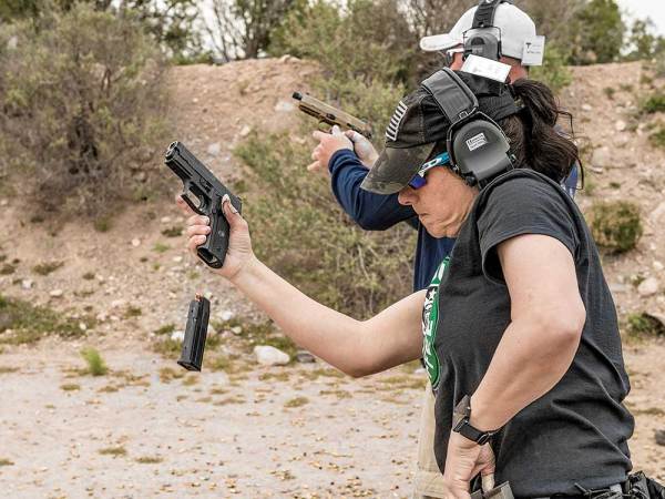 Suzanne Rickabaugh works on her reloads during a class at Gunsite.