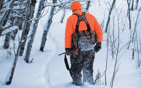deer hunter tracking snow