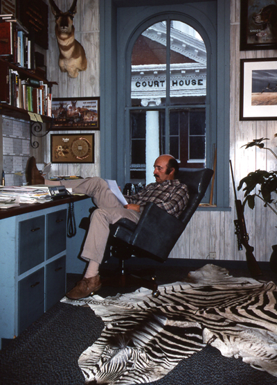 jim carmichel at his desk in jonesboro