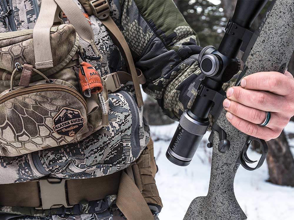 hunter holding a riflescope