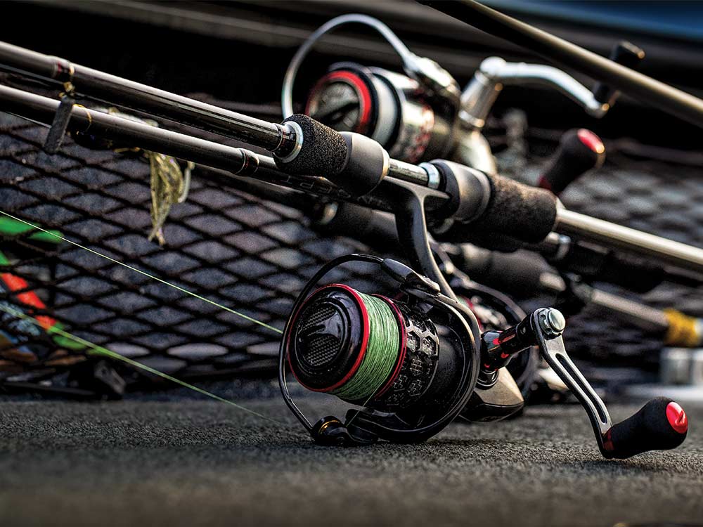 fishing reel resting in a boat deck