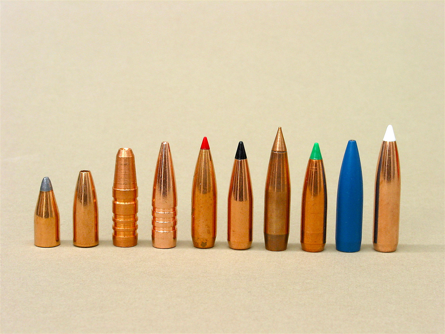 bullets lined up on tan background