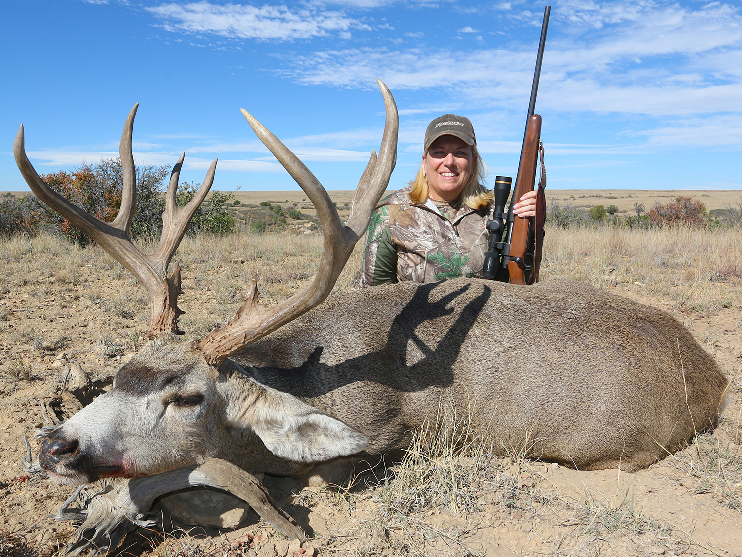 Linda Powell and dead mule deer