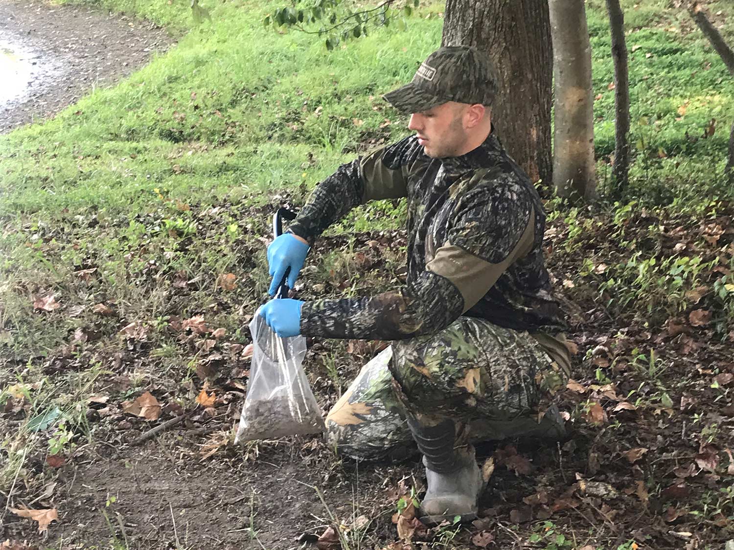 hunter collecting a scrape