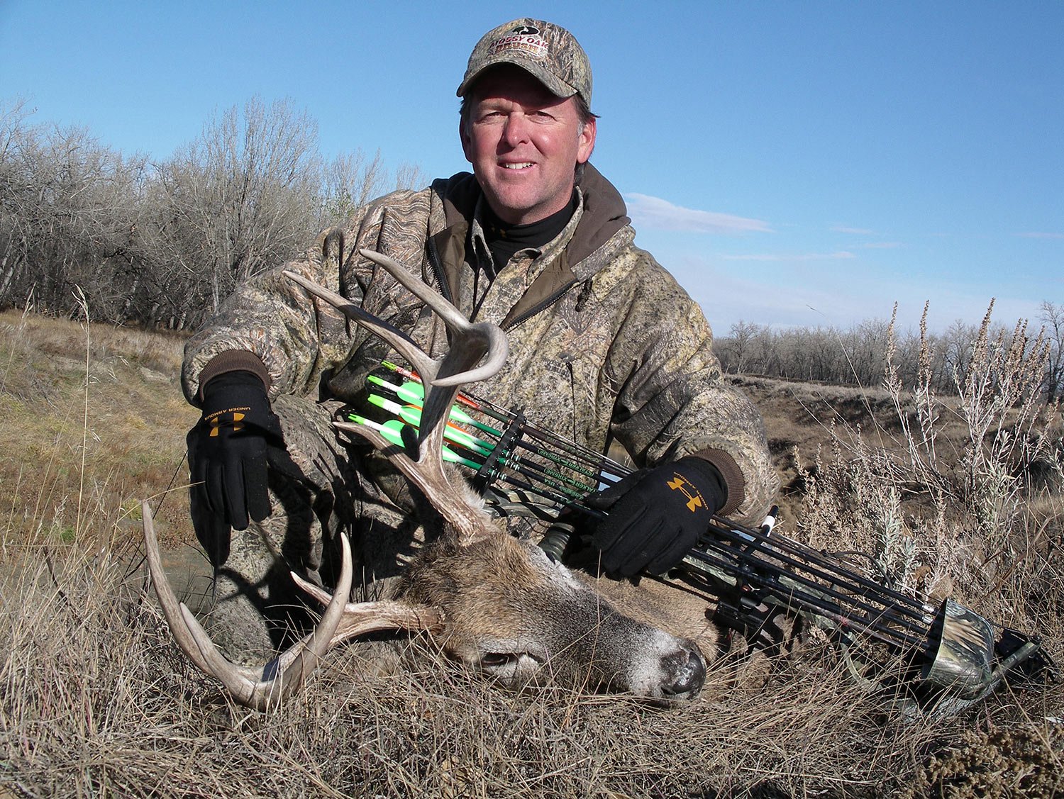 A hunter with a nice buck