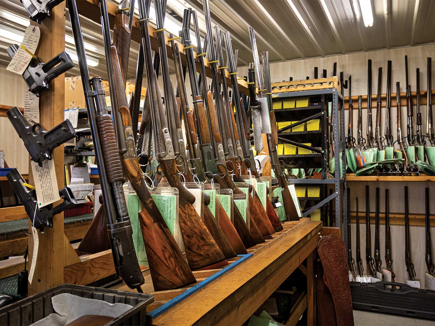 guns stored in a store-room on racks