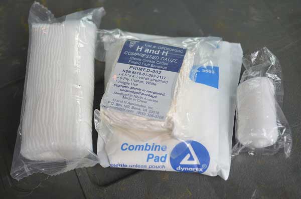 packages of different types of emergency medical gauze.