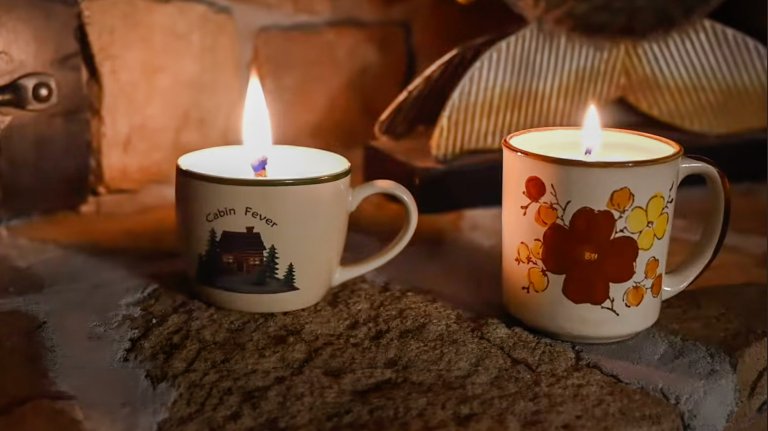 Two mugs turned into DIY candles made from deer tallow
