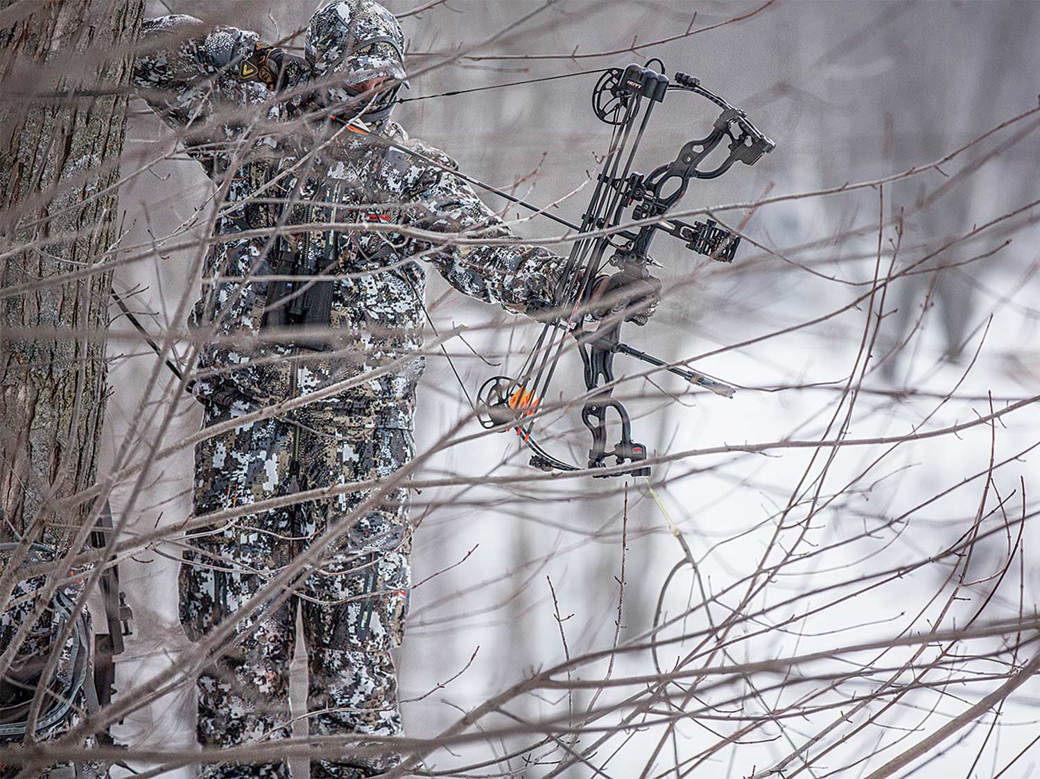 A late-season hunter waits on a frosty Alberta buck.