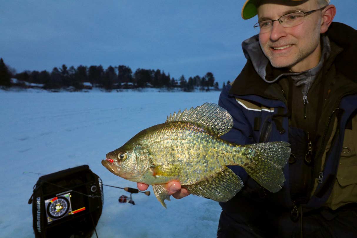 Low light periods focus midwinter crappie action on clear lakes.