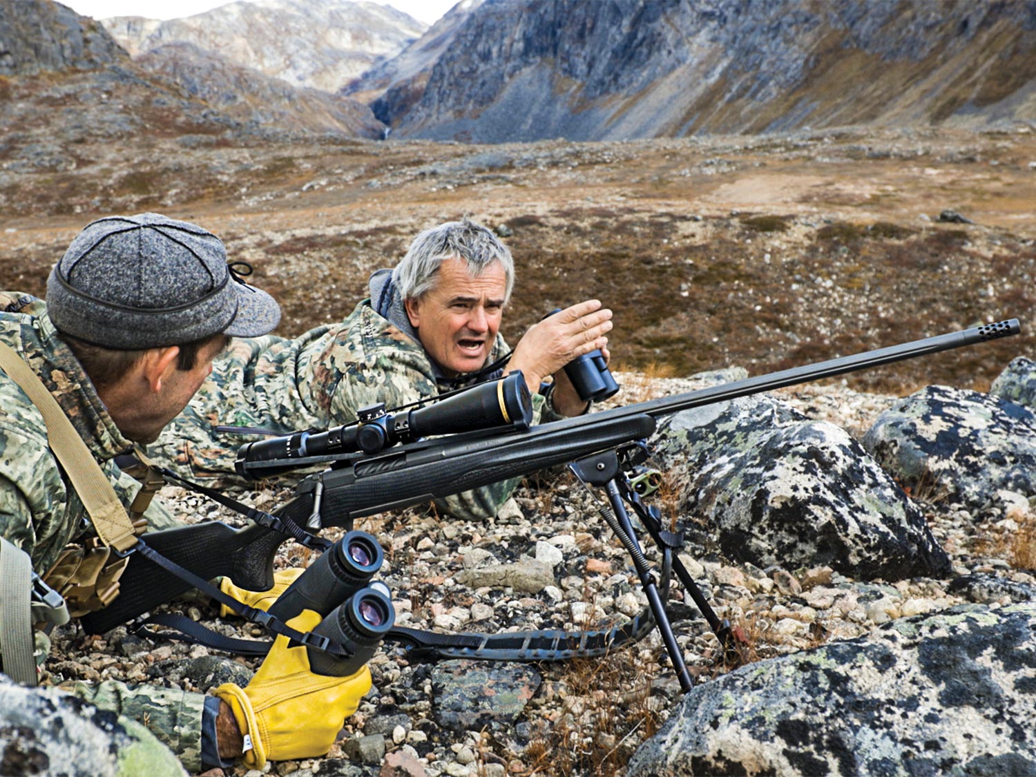 Frank Feldmann and the author set up for a long shot at grazing musk ox.