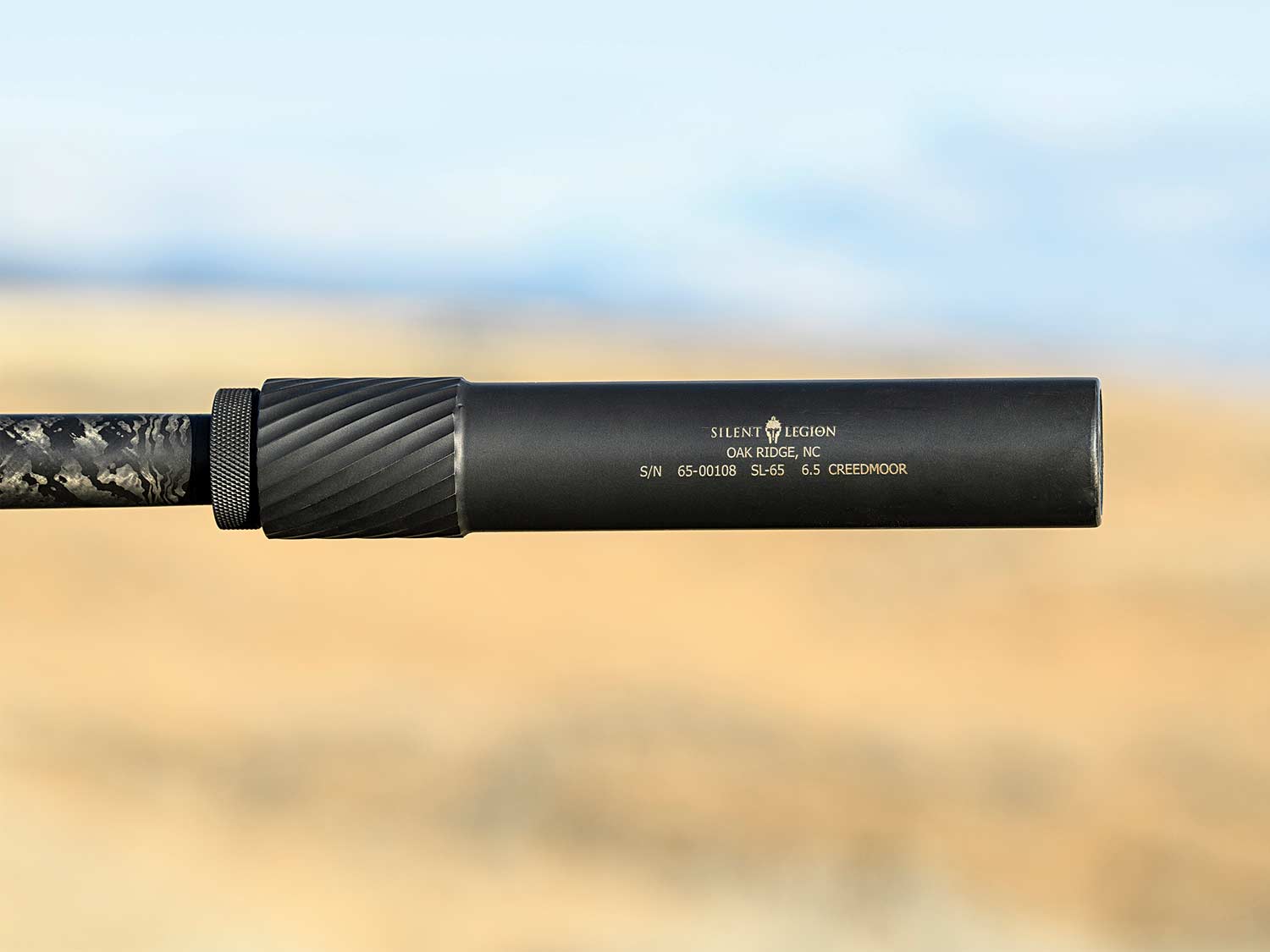 Rifle equipped with a Silent Legion 6.5mm suppressor.
