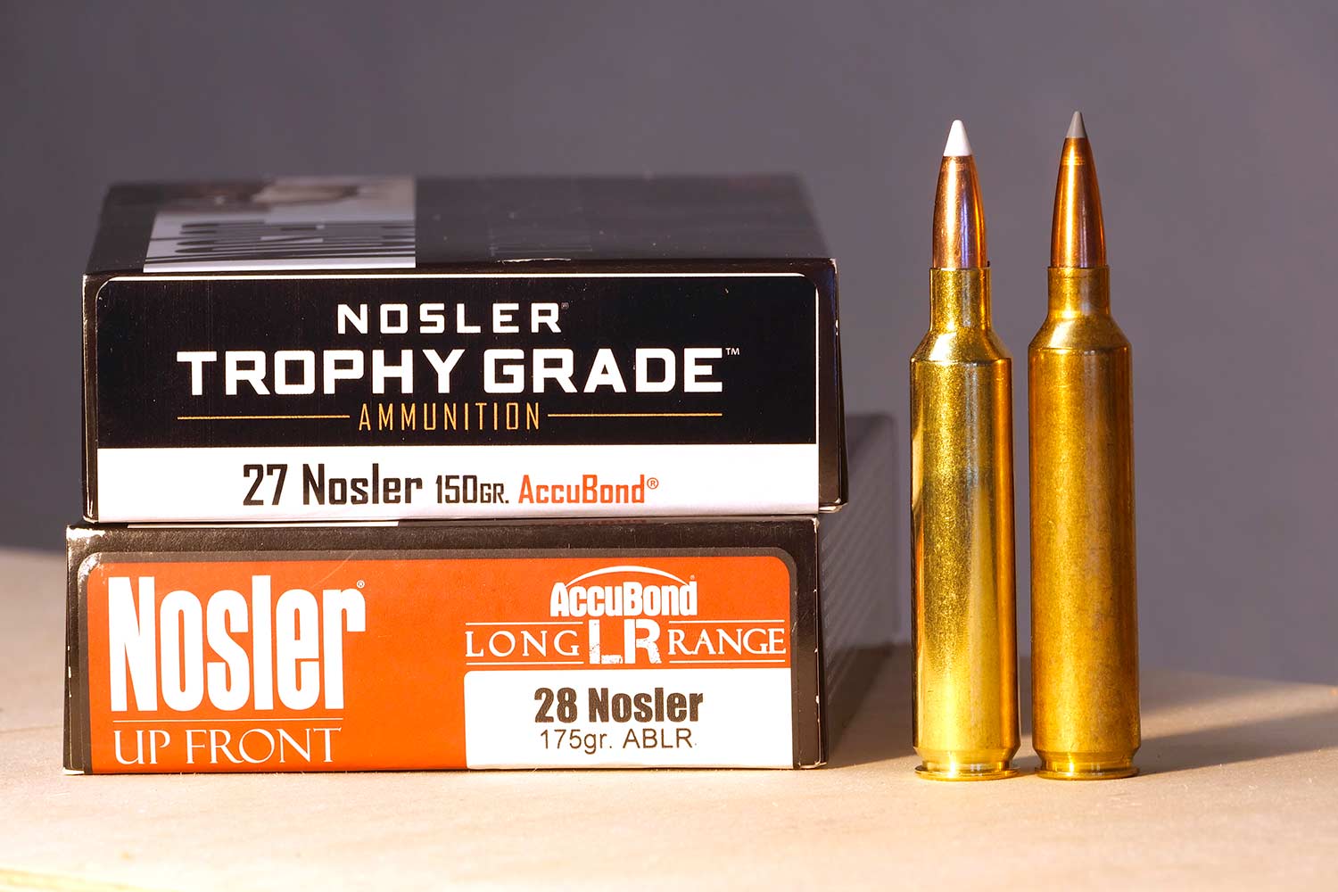 Two boxes of nosler rifle ammo.