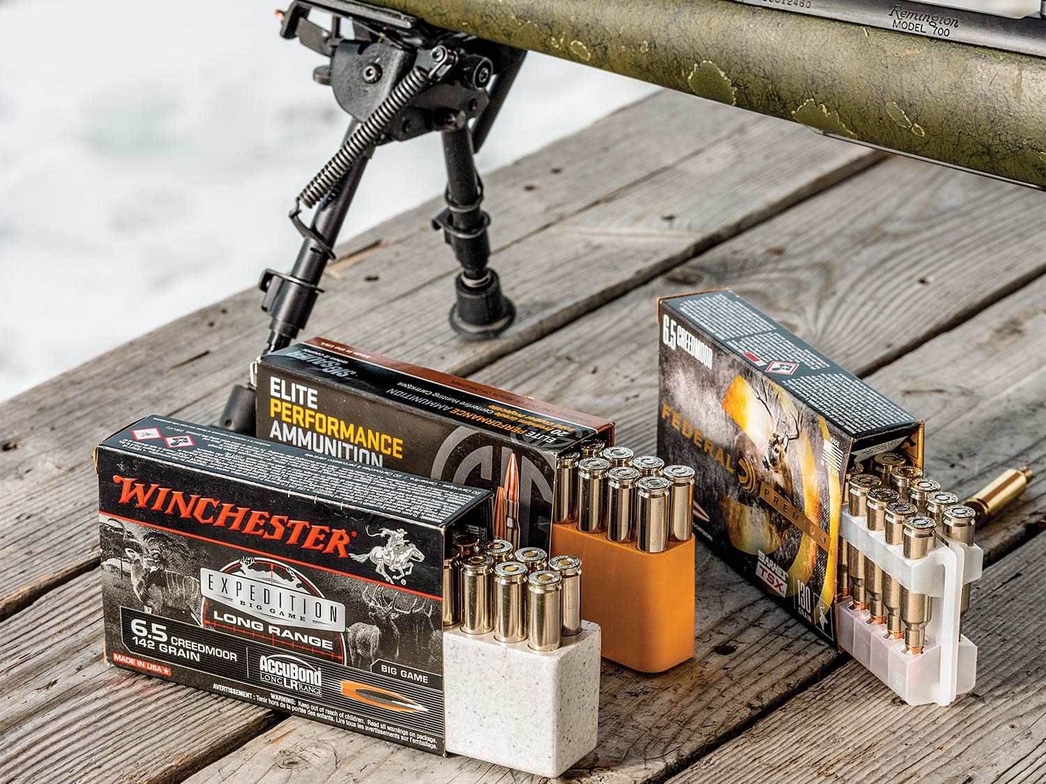 A rifle and three sets of hunting ammo.