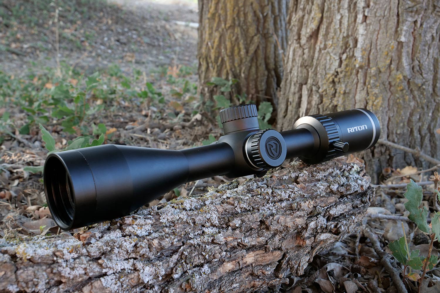 A Riton Riflescope on a log.
