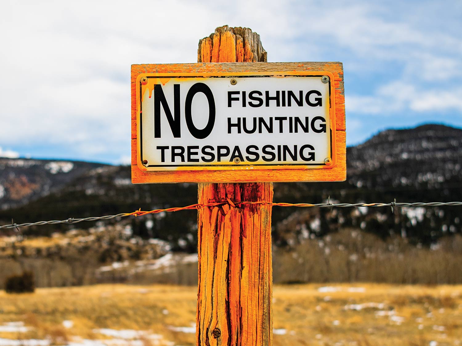 No Fishing, Hunting or Trespassing sign.