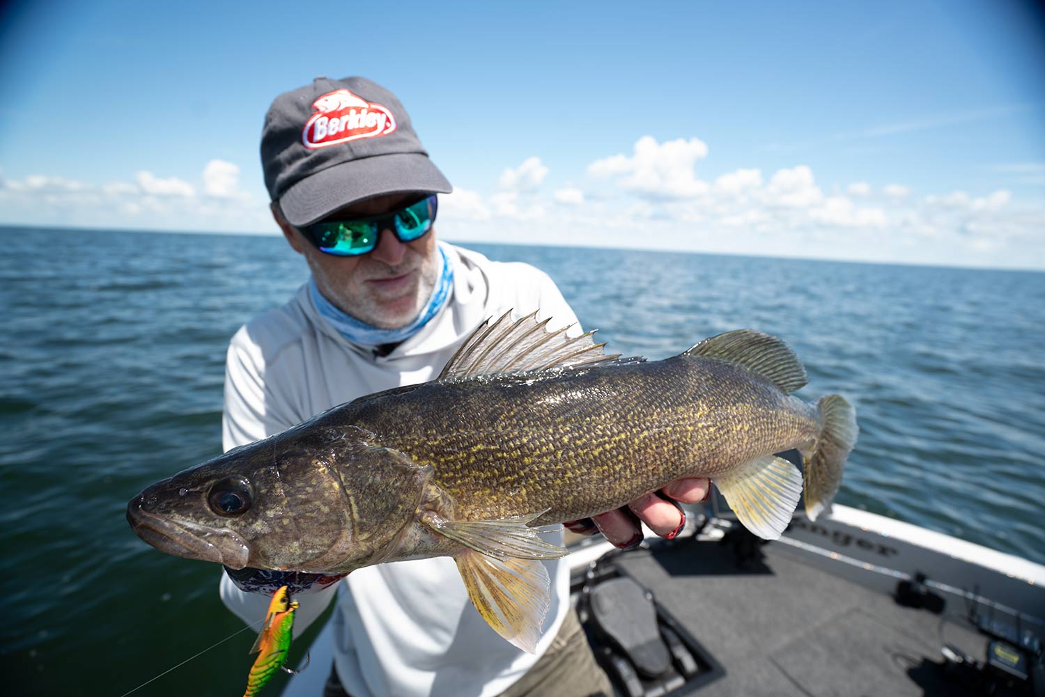 Steven Pennaz holding up a large walleye.