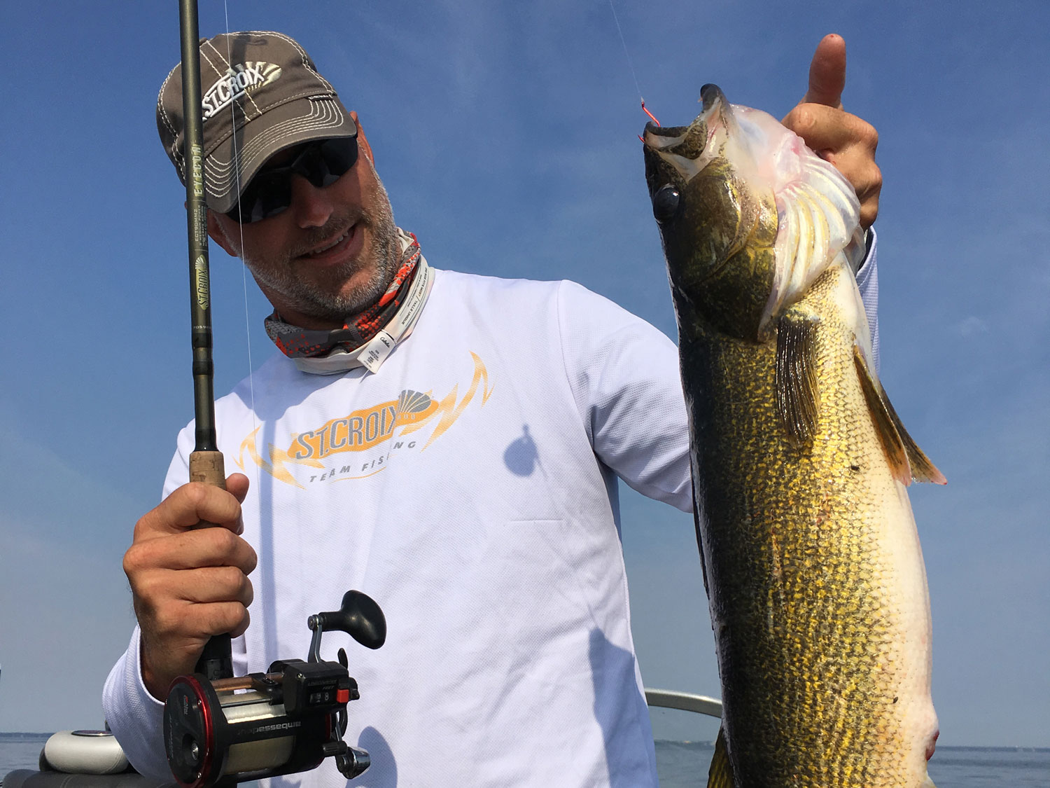 Brian Bashore holds up a large walleye.