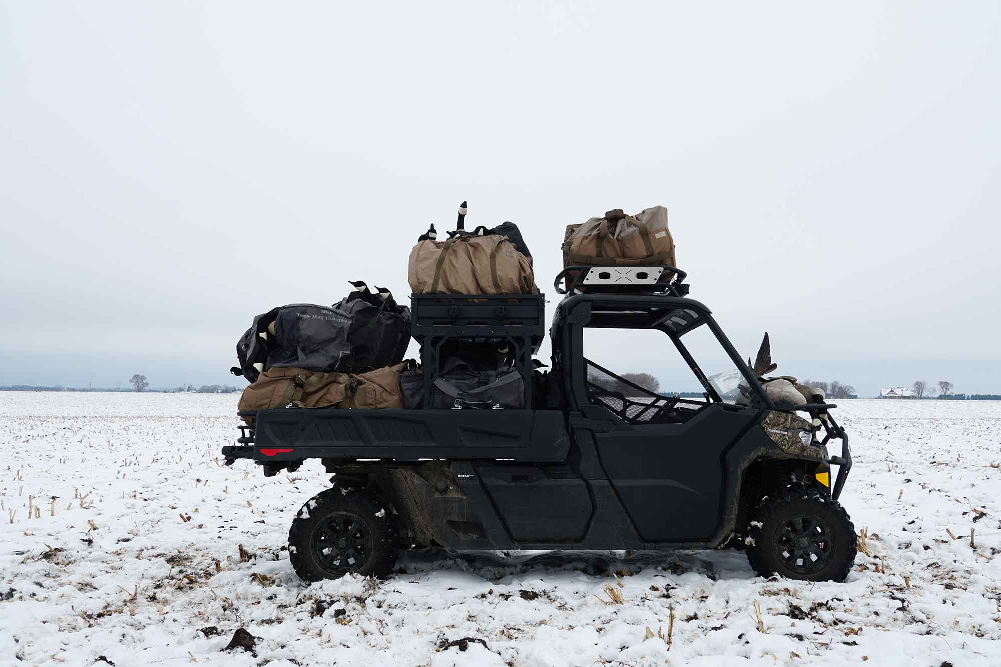 The Can Am Defender fully loaded after a cold hunt in Minnesota.