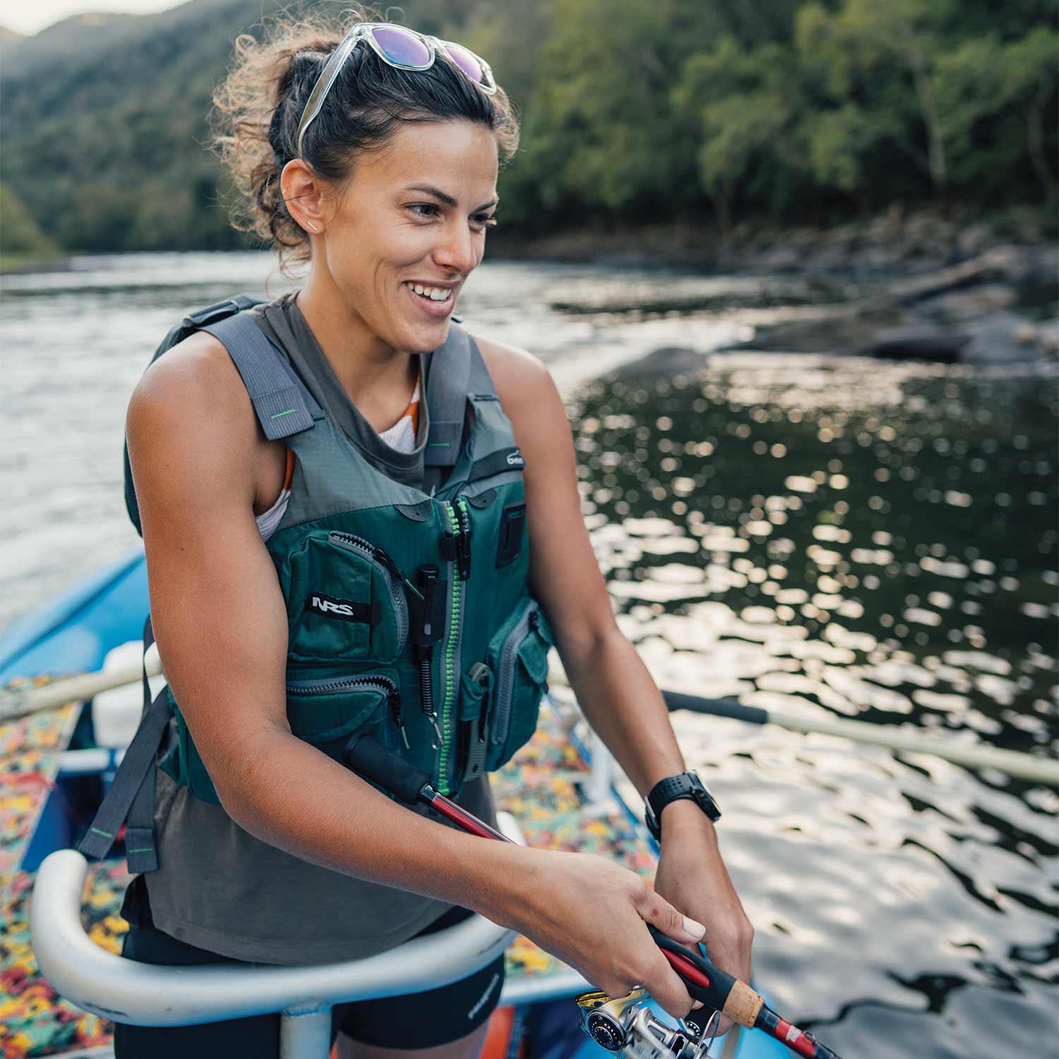 Natalie Krebs of Outdoor Life fishing on a raft.