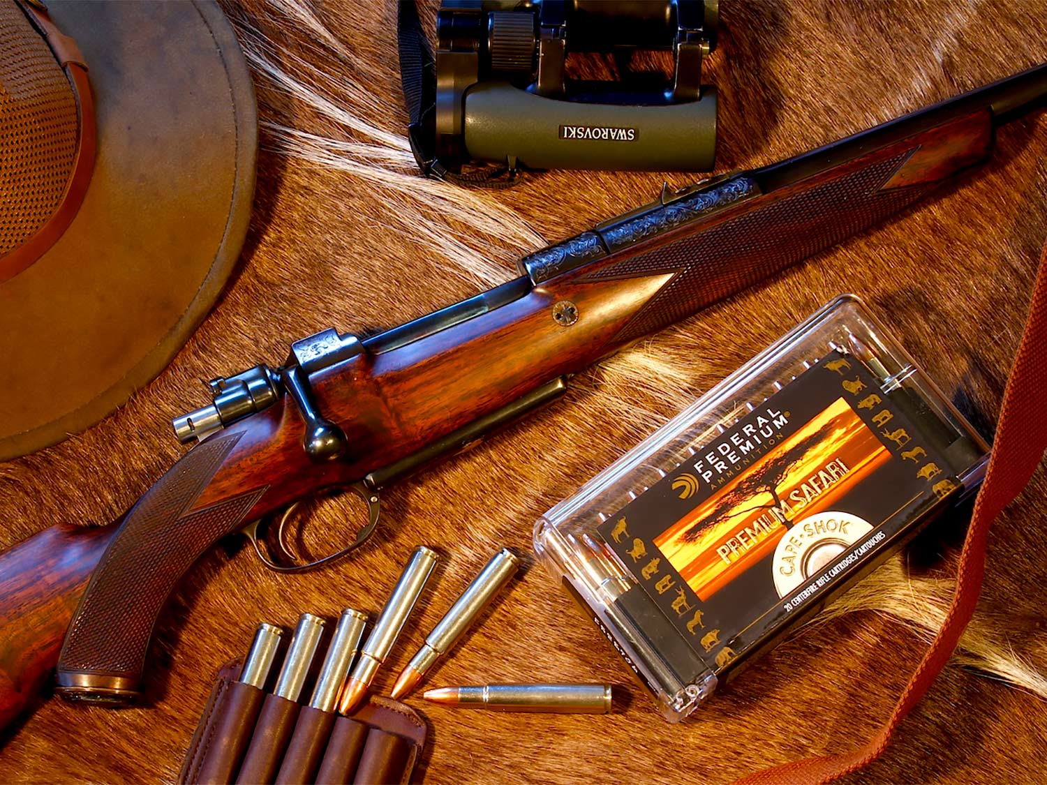 A rifle and hunting ammo and gear.