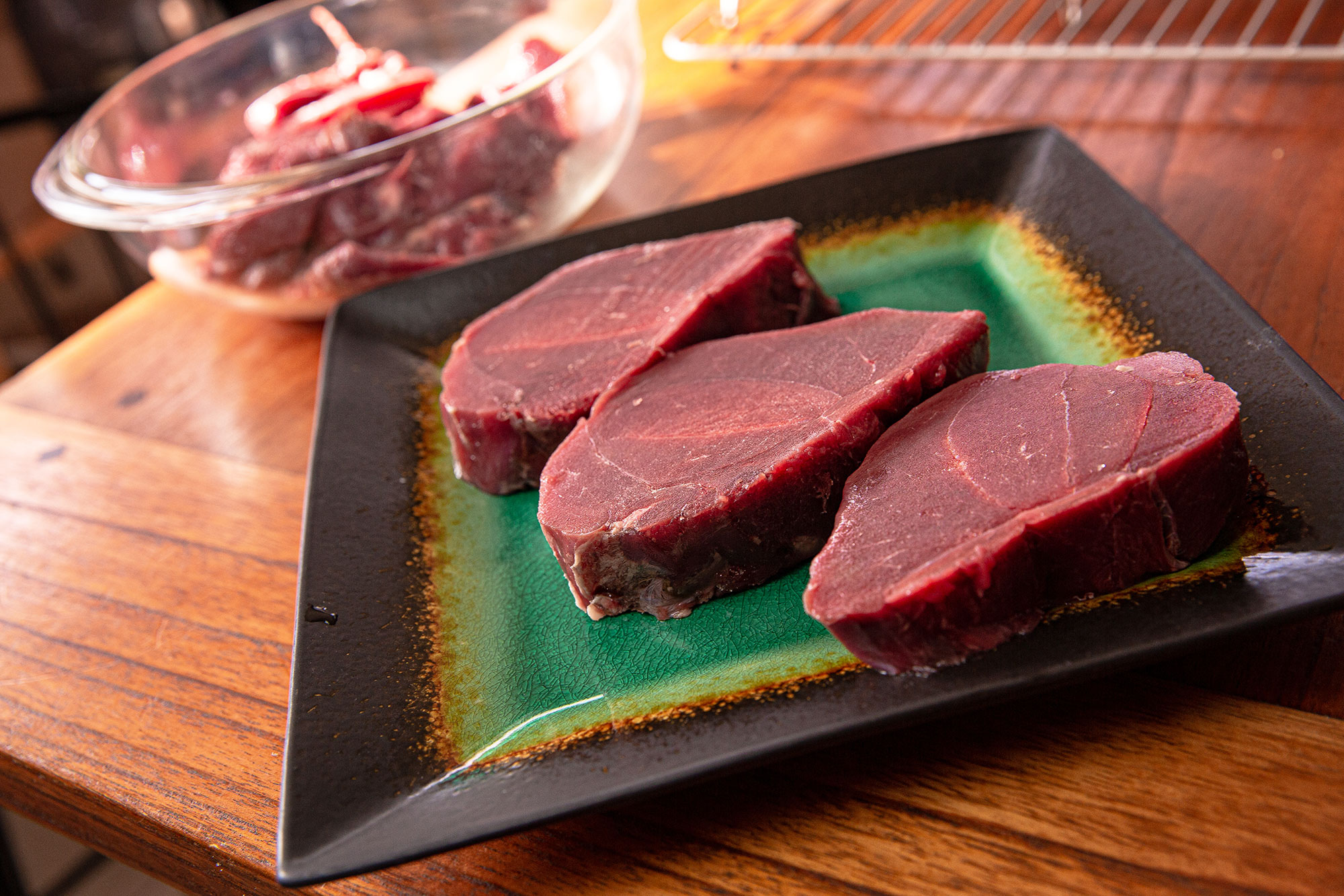 Cut wild game and venison steaks to a uniform thickness.