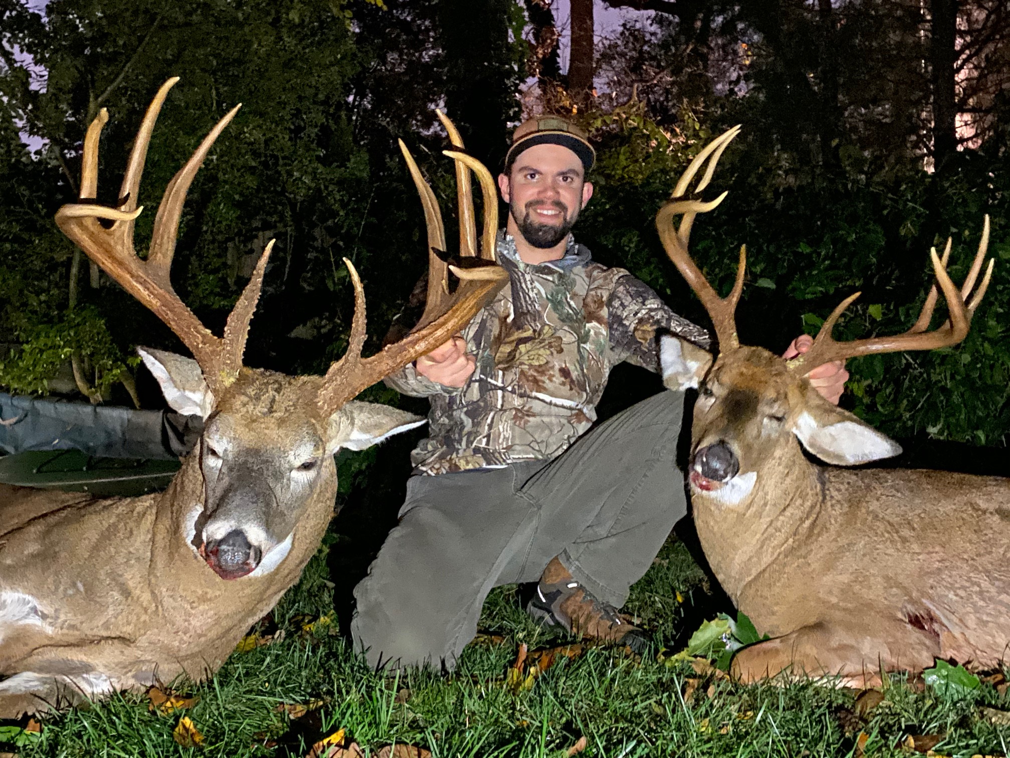 Dieter Herbert arrowed a 130 class buck (right) just minutes before shooting one of the biggest typical whitetails in New York history.