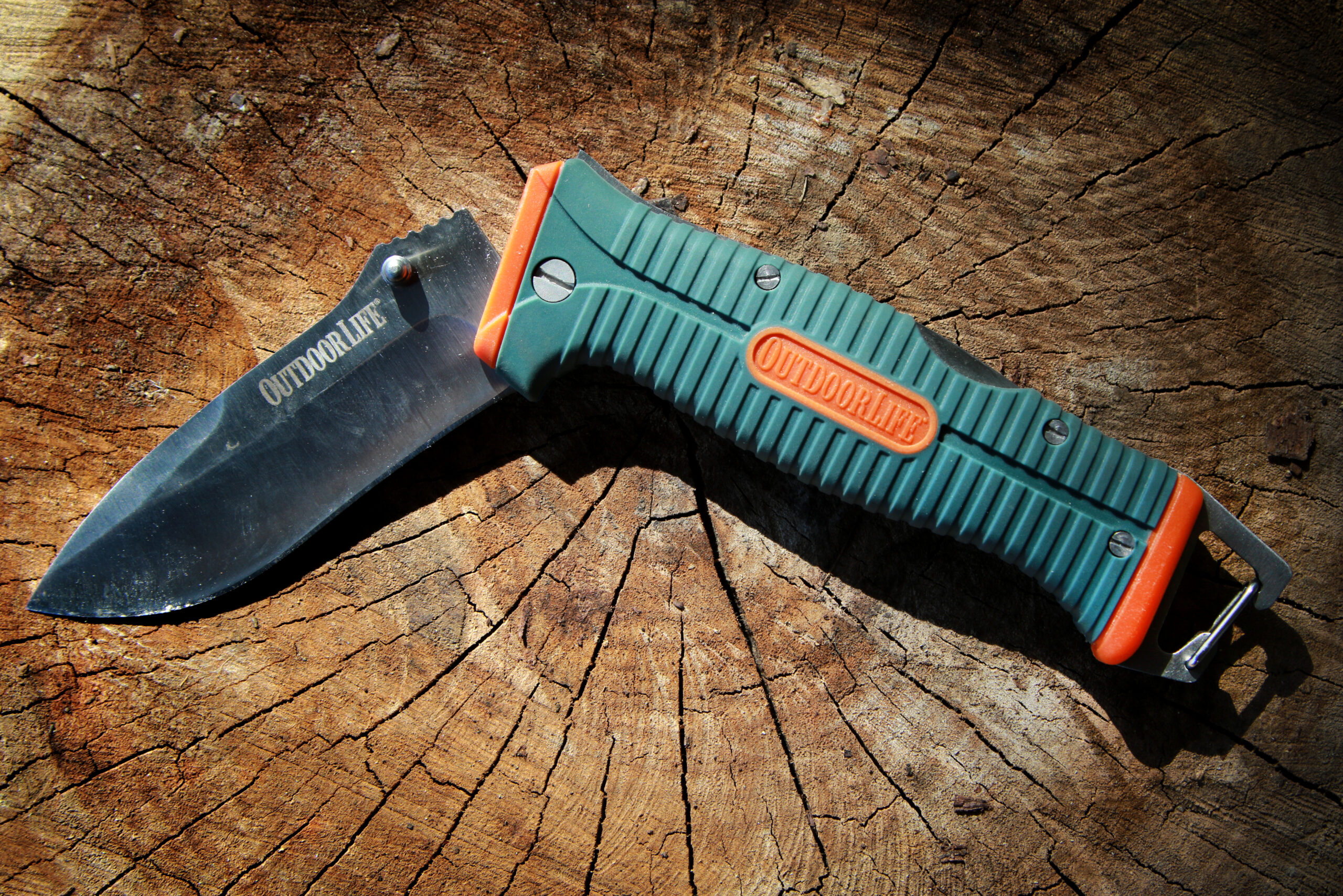 A partially unfolded camping folder knife, from Outdoor Life.