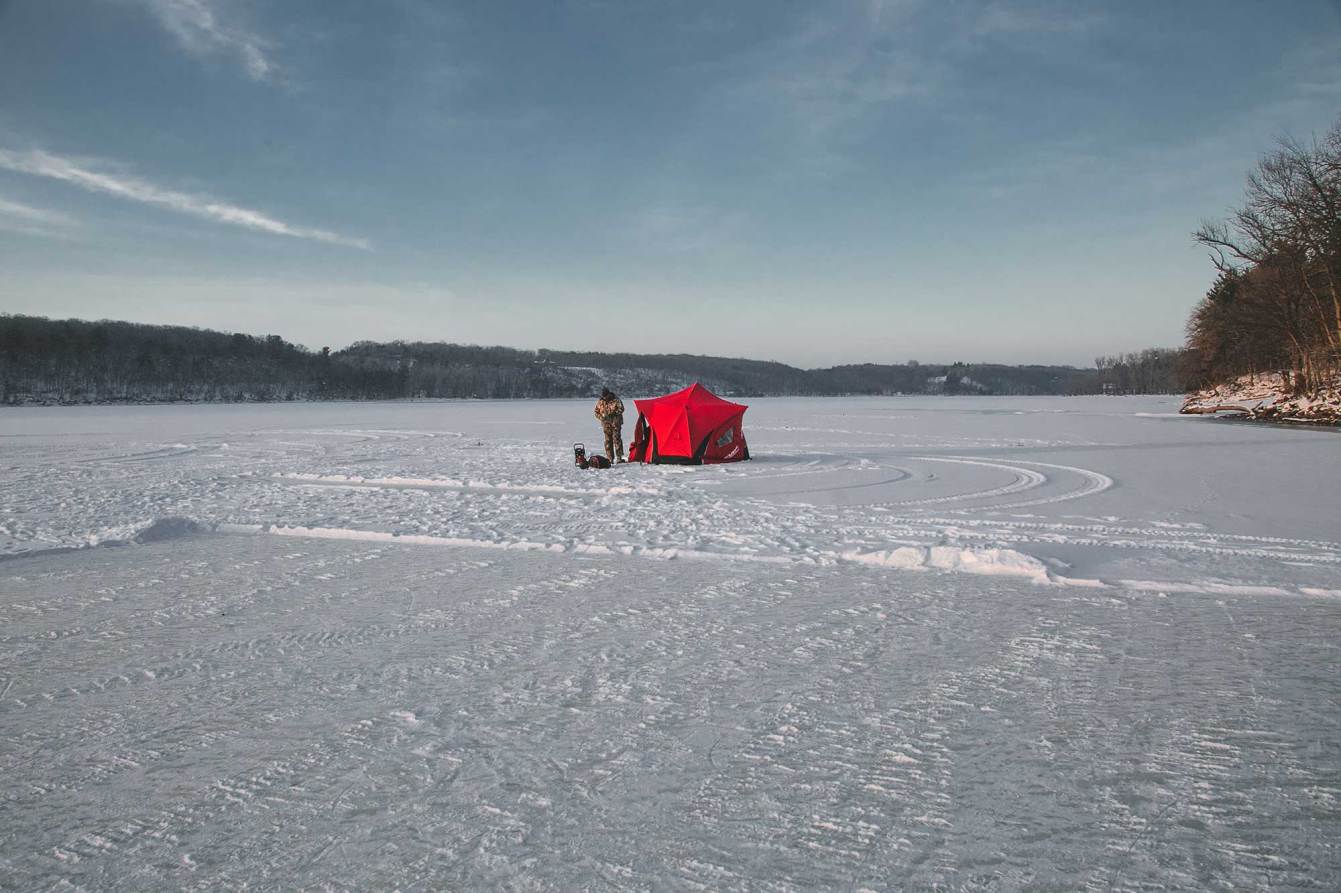 One of the best ice fishing shelters sits on the ice.