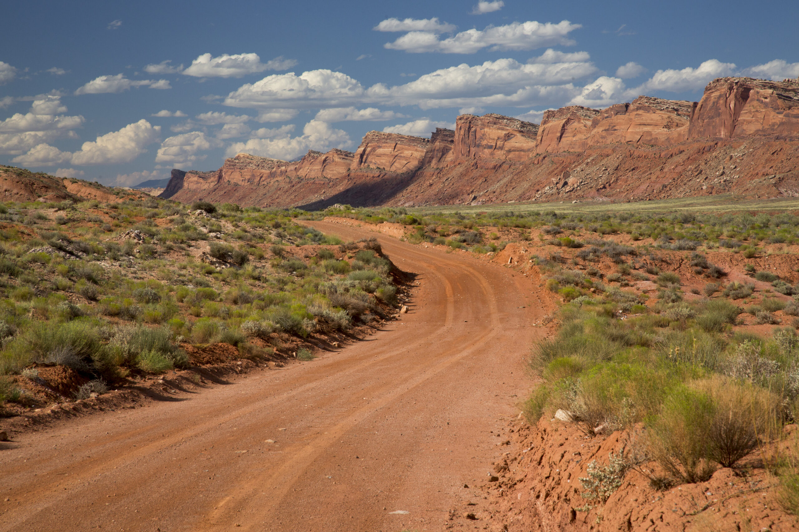 Bears Ears National Monument dirt road and cliffs.