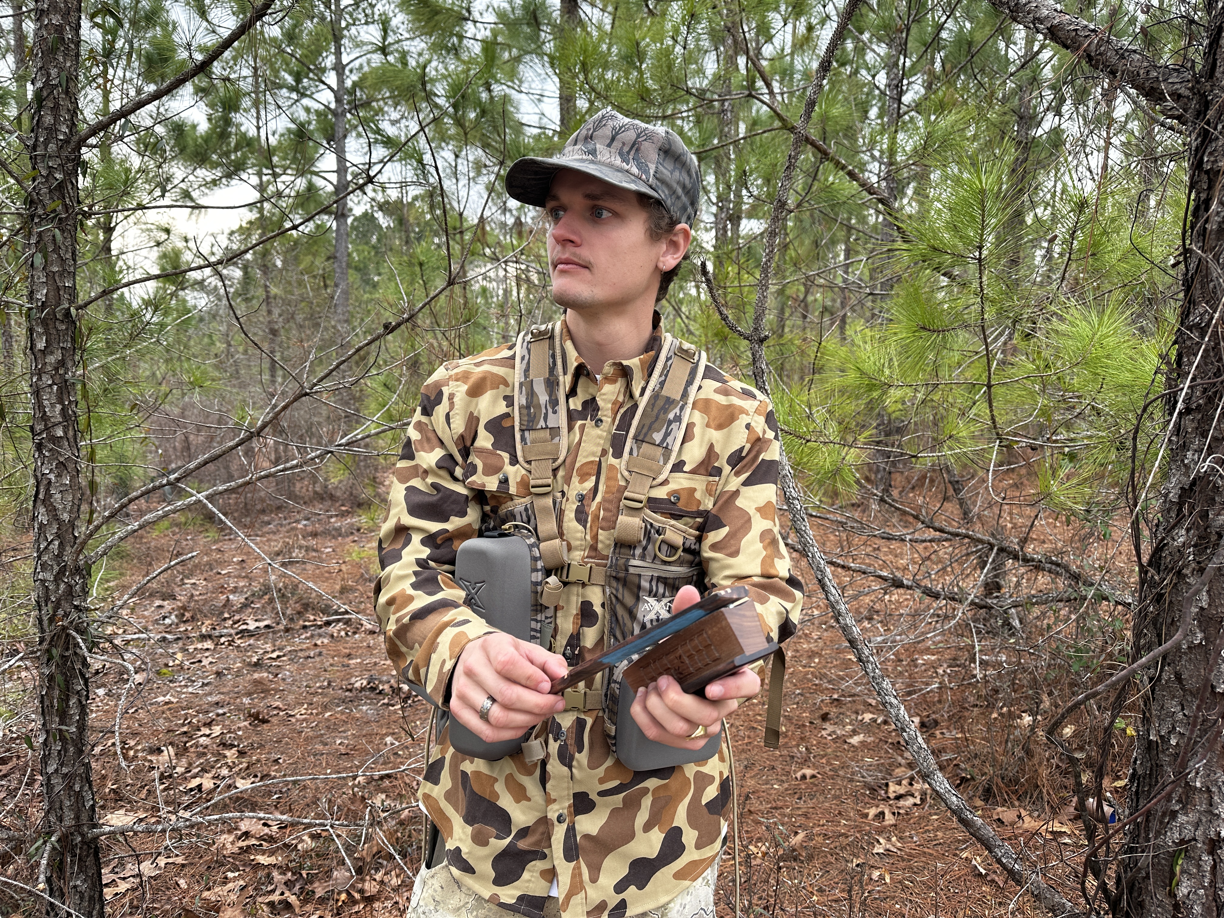 Using a box call while wearing the Ridge Runner vest. 