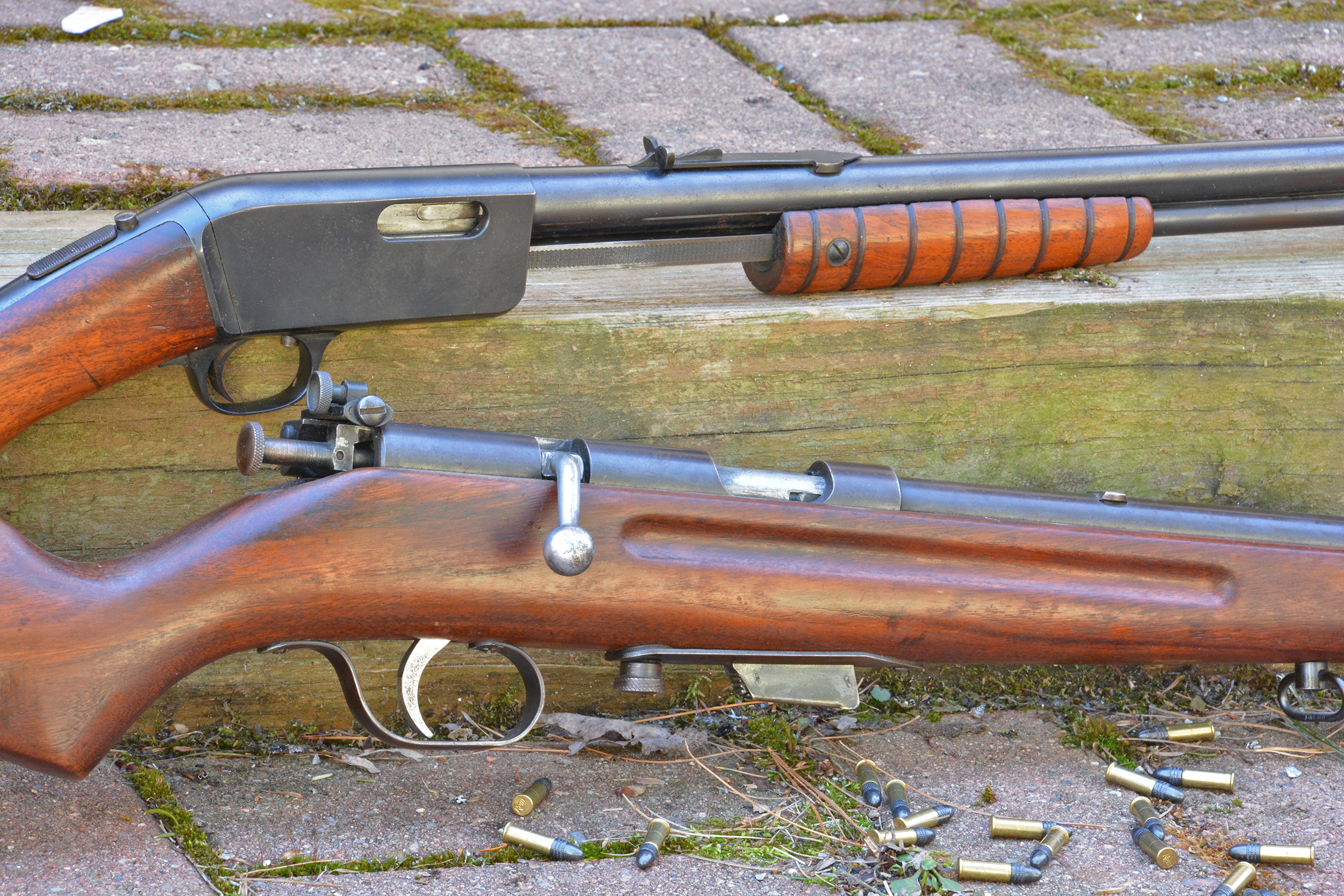 Two Marlin rimfire rifles, one from before WWI and the other manufactured after.