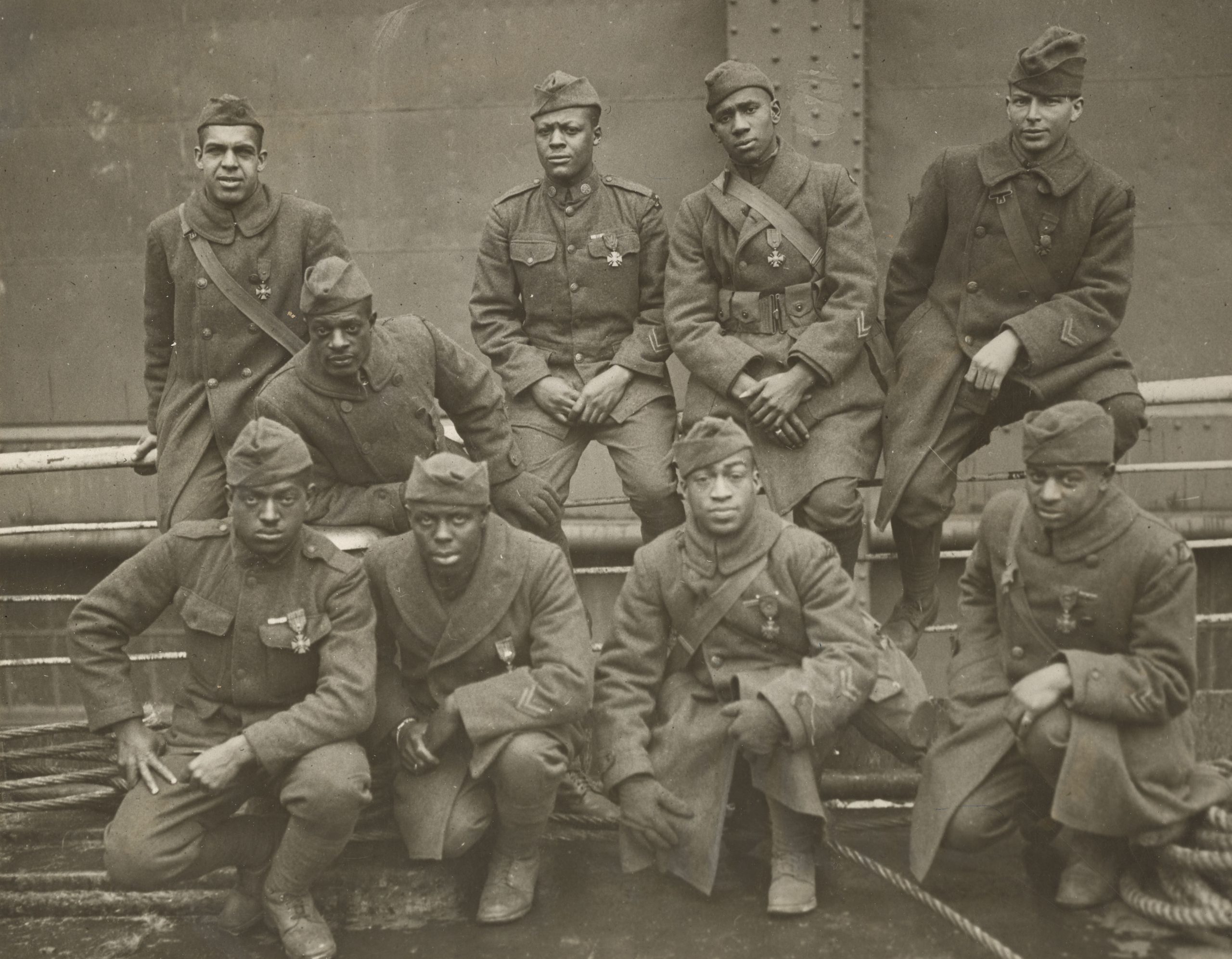 Nine members of the Harlem Hellfighters from WWI.