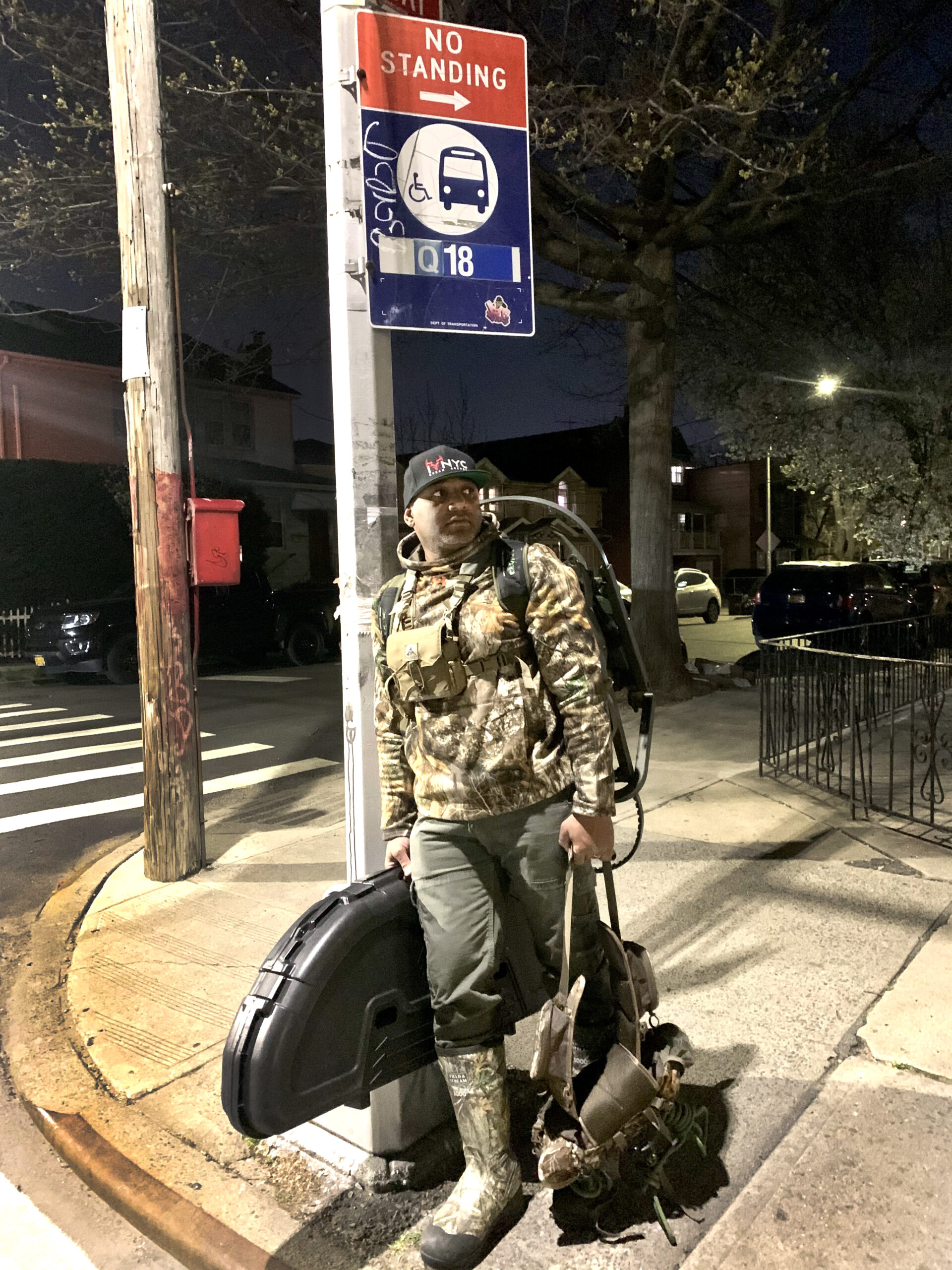 Cliff Cadet waits for an NYC bus.