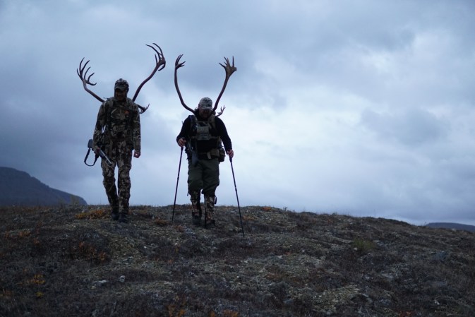 Two non-resident caribou hunters packing out meat and antlers in the proposed closure area.