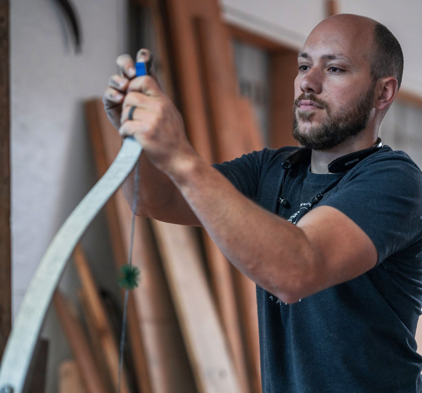 Trent Wengrad is working in his shop.