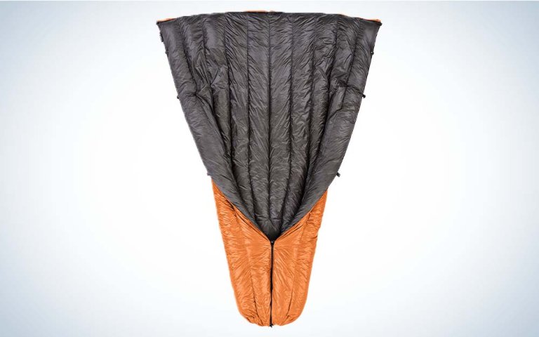 A grey and orange quilt