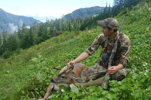 Hunter with hunting gear in Alaska