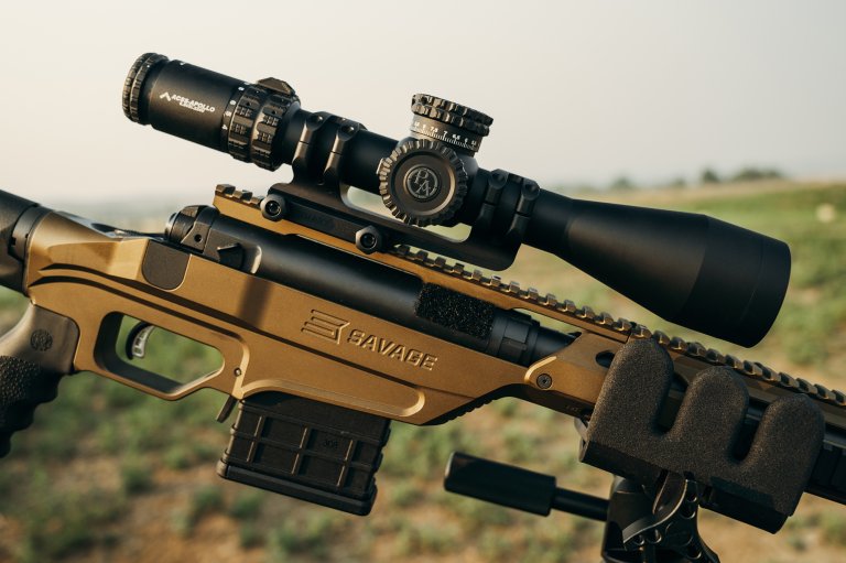 Primary Arms scope atop a gold rifle