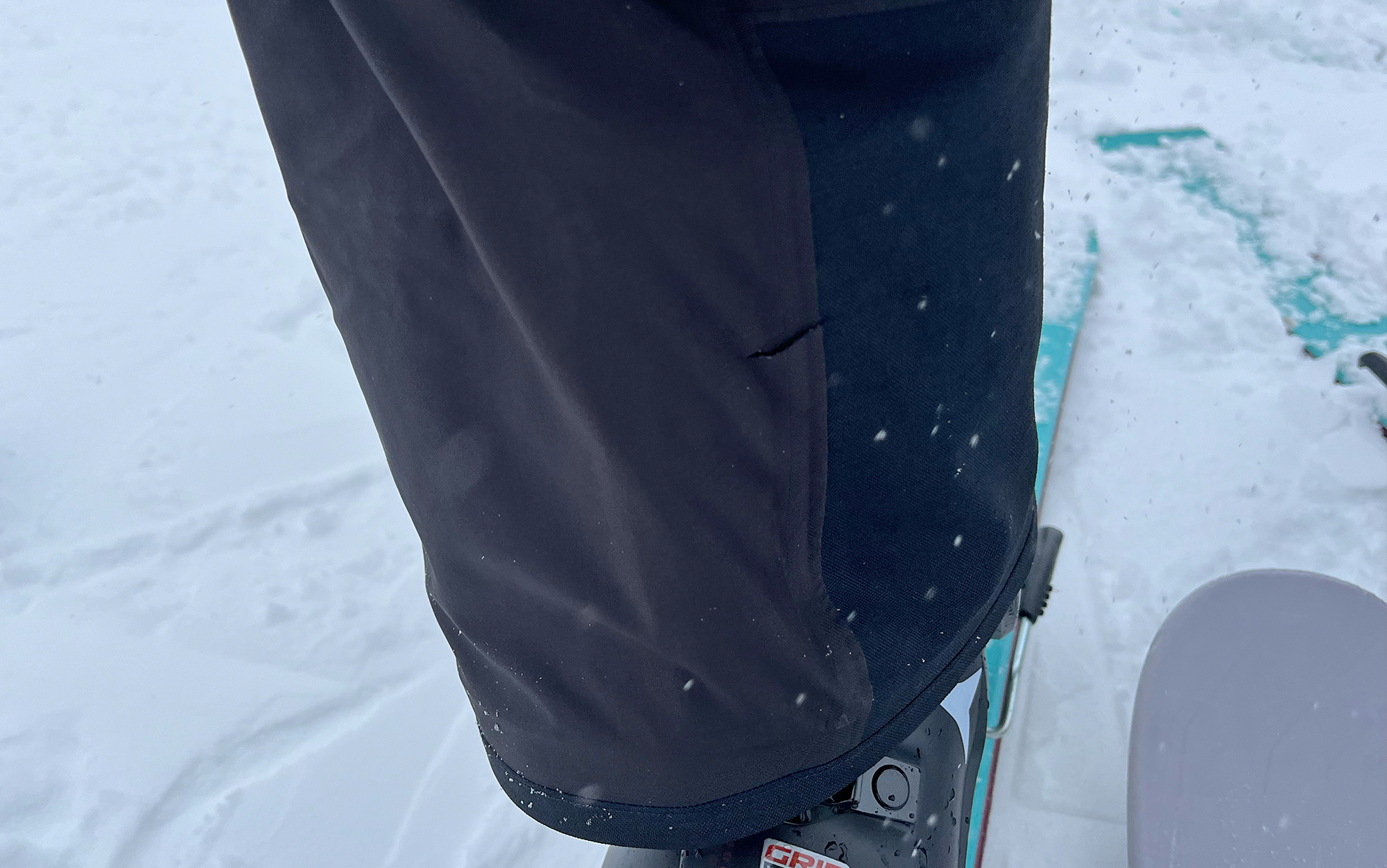 Here is the most offensive tear. It wasn’t able to penetrate the reinforced cuff, but I still expect more durability from the best snow pants.