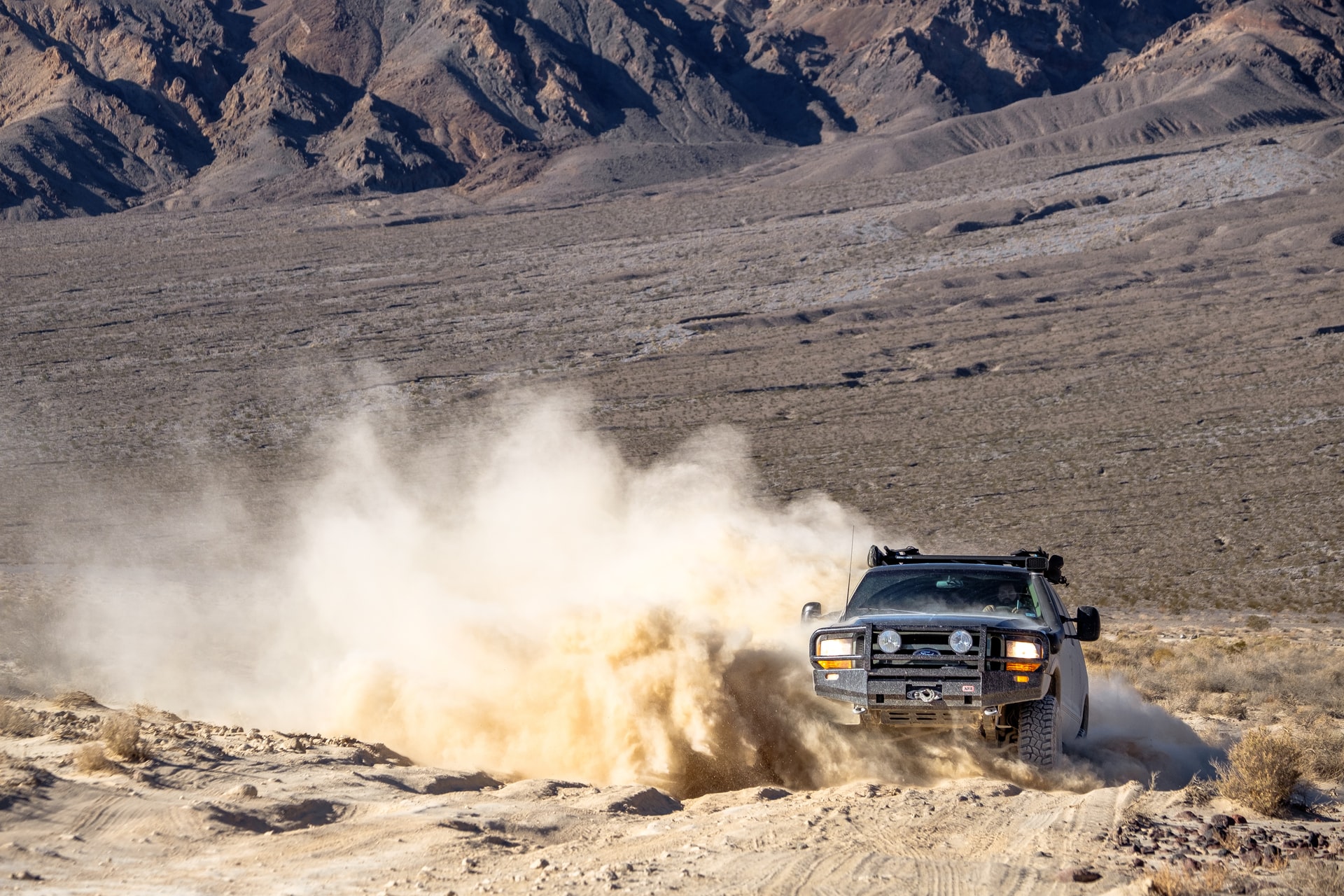 You're likely going to want a truck with more low-end torque.
