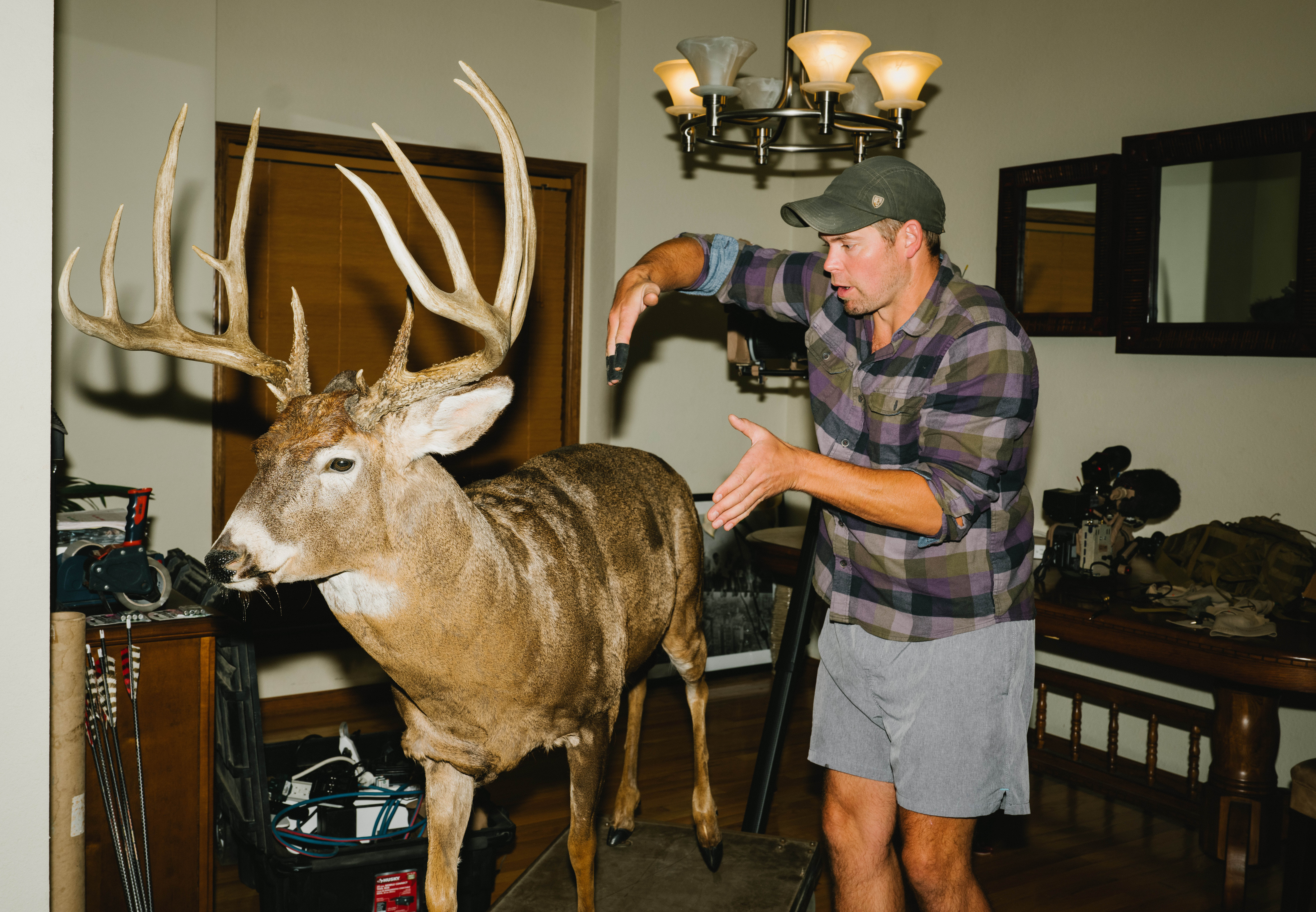 Demonstrating shot placement on a whitetail buck.