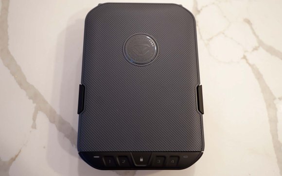 One of the best gun safes, the Vaultek LifePod sitting on a counter