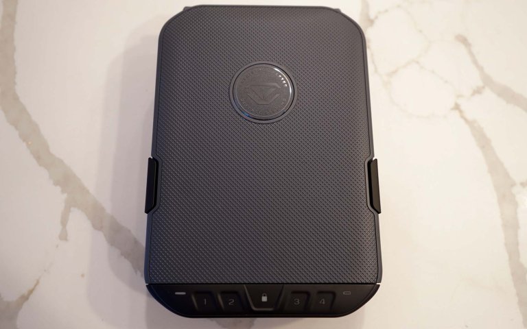 One of the best gun safes, the Vaultek LifePod sitting on a counter