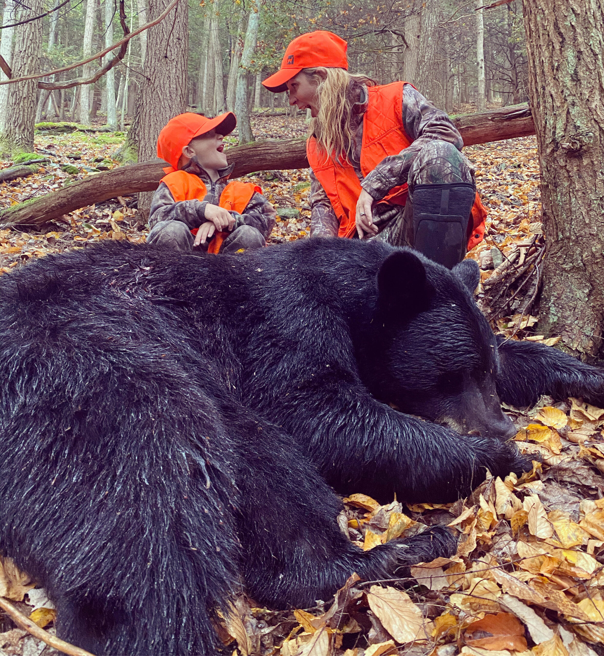 Tressa McCune with a 300-pound black bear taken on public land.