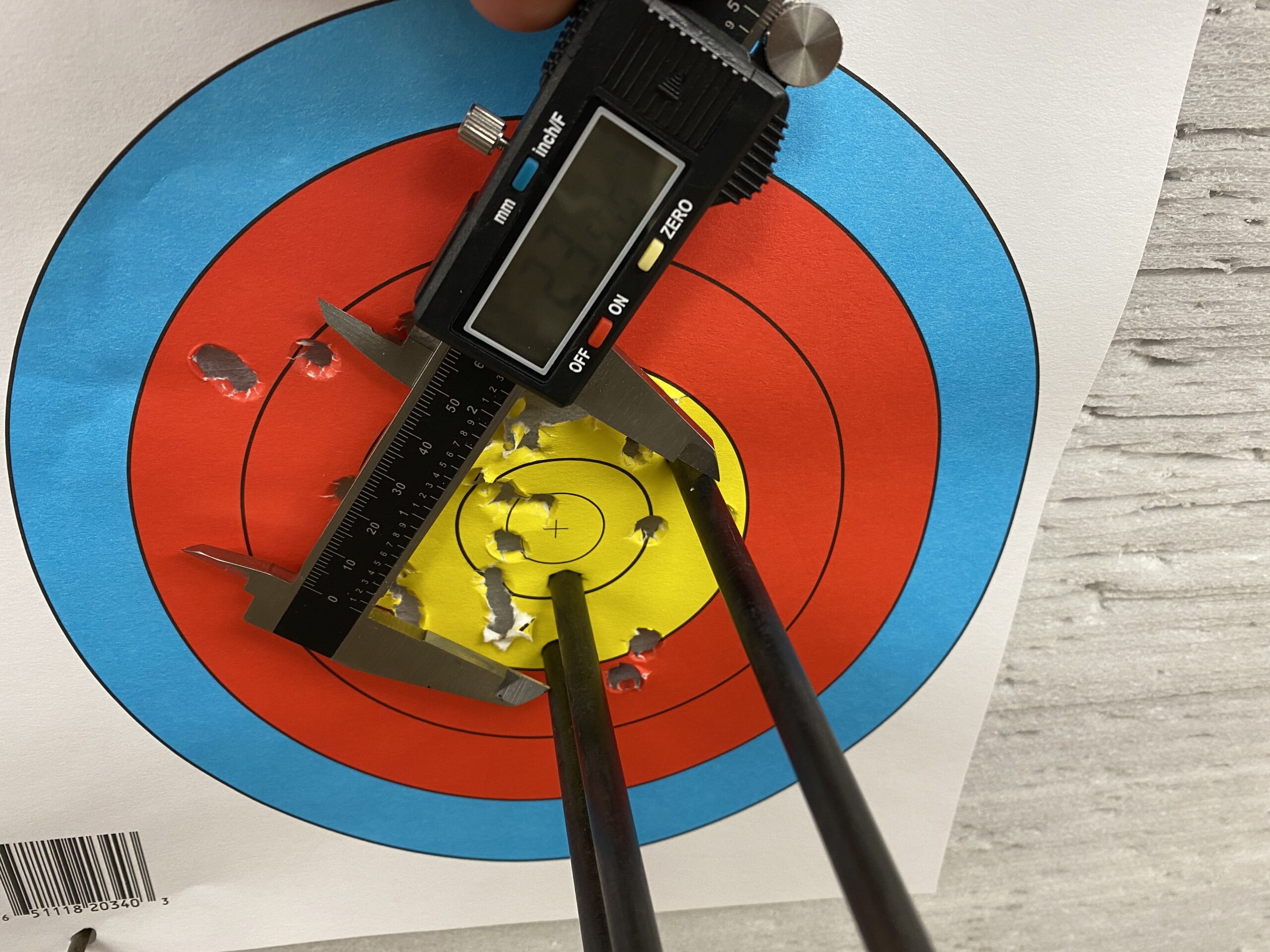 Measuring arrow groups with calipers